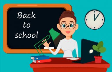 Okula dönüş. Clas derste iken masasında oturan öğretmen