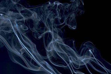 Siyah bir arka plan üzerinde tütsü. Hareket desenler arka plan grafik duman.