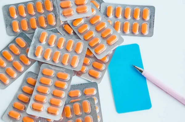 orange pills medicine  on white background