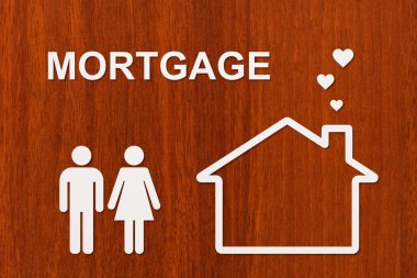 Kağıt ev ve aile ile ipotek metin. Kavramsal görüntü