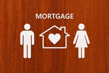 Kağıt ev ve aile ile ipotek metin. Kavramsal görüntü