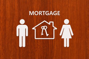 Kağıt ev ve aile ile ipotek metin. Kavramsal görüntü