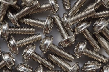 Closeup metal gri arka plan üzerinde cıvata