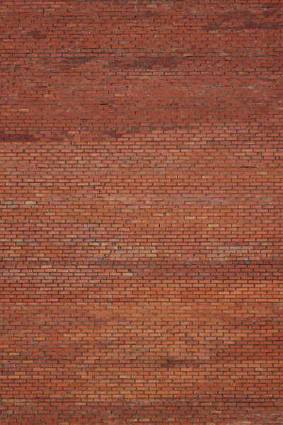Каменная стена из красного кирпича — стоковое фото