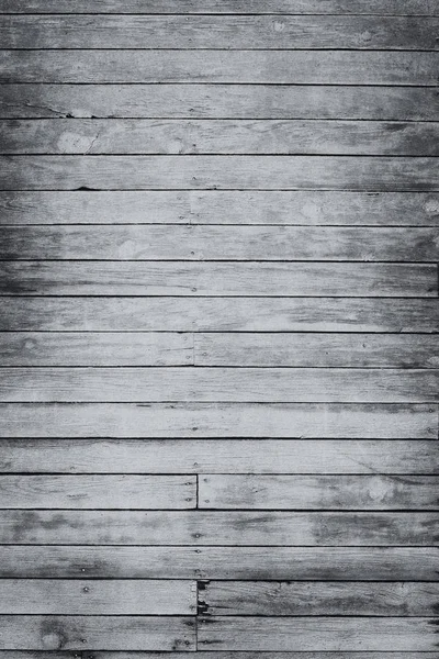 Vieilles planches de bois gris minable avec de la peinture de couleur fissurée — Photo