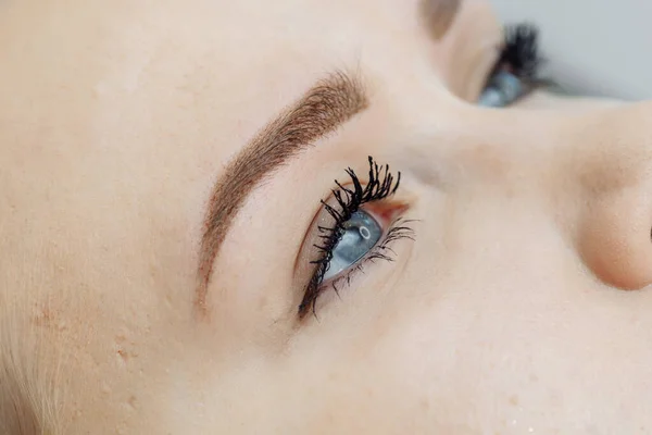 Result of permanent makeup, tattooing of eyebrows — Stock Photo, Image