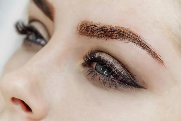 Result of permanent makeup, tattooing of eyebrows — Stock Photo, Image