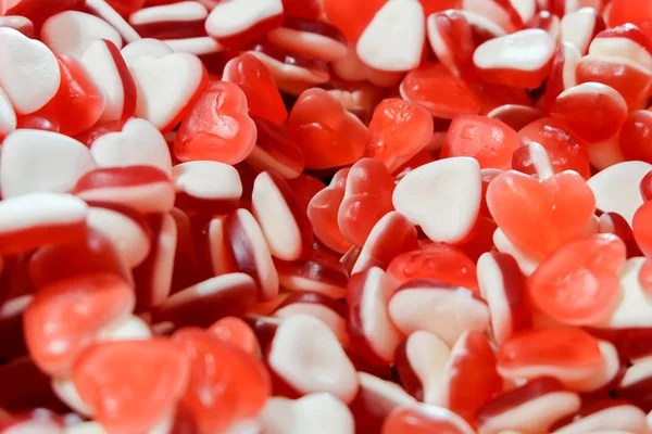 Punainen valkoinen sydän muoto hyytelö Candy karkkia välipala ryhmä. makea Ystävänpäivä tausta . — kuvapankkivalokuva