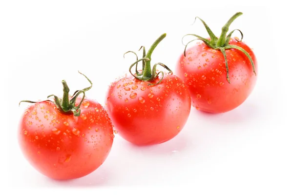 Drei frische rote Tomaten — Stockfoto