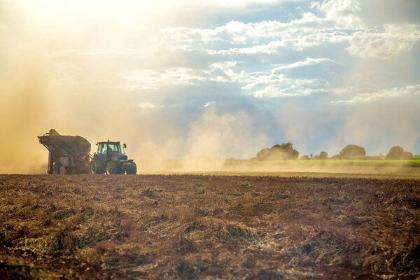 Peanut tractor plantation field 