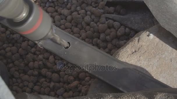 Metal drilling closeup in metal workshop in a private garden. Handmade fence — Stock Video