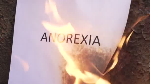 Пылающее слово анорексия — стоковое видео