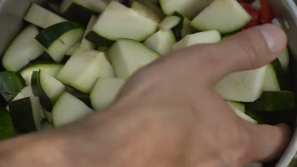 Man preparing zucchini in the open air close up — Stock Video