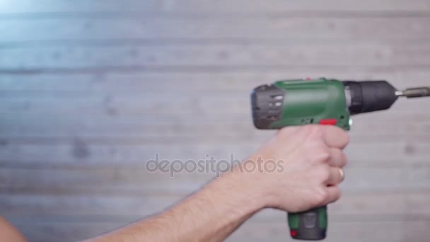 Hand inserts drill — Stock Video