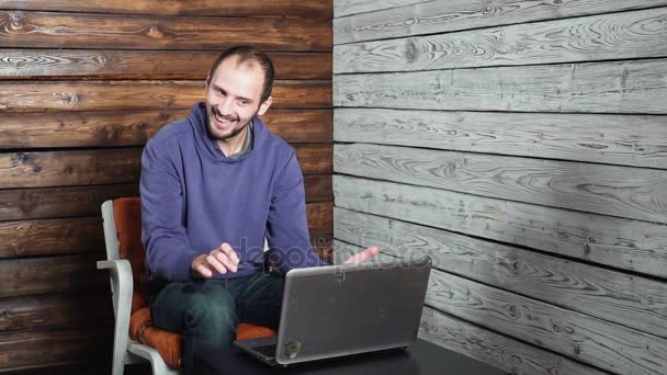 Business, people, success and fortune concept - happy businessman throwing up euro money and sitting at table in office — Stock Video