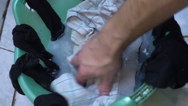 Closeup washing underpants in basin by hand. mens hands, washing underpants. concept of lonely men — Stock Video