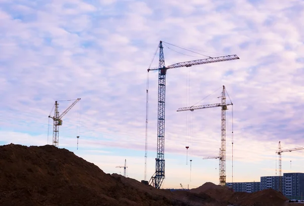 Gündoğumu günbatımı, Vinç ve bina inşaat alanında