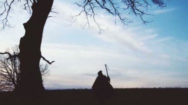 Azrail günbatımı siluet. ölüm kavramı.