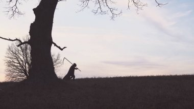 Azrail günbatımı siluet. ölüm kavramı