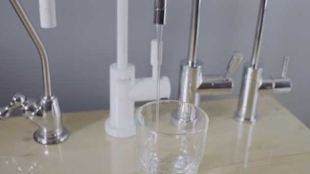 Filling glass drinking water from filter tap. Water tasting. Healthy lifestyle — Stock Video