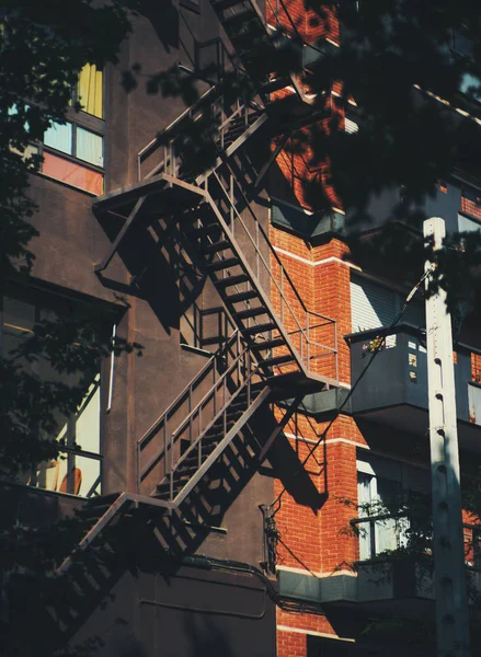 Pompier ladder on facade of a house — Stock Photo, Image