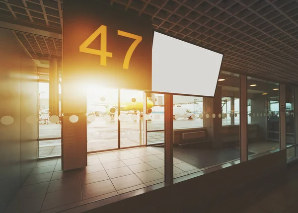 Airport gate with blank LCD screen mock up — Stock Photo, Image