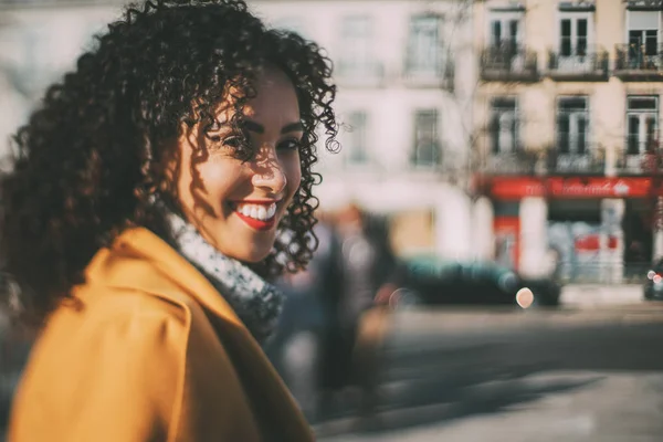 Tilt shift portrait of curly brazilian lady — Stock Photo, Image