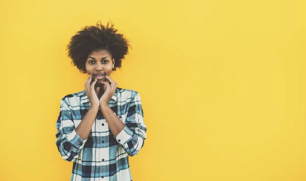 Surprised cute black curly girl — Stock Photo, Image