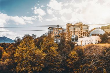 Cableway during bright autumn day clipart