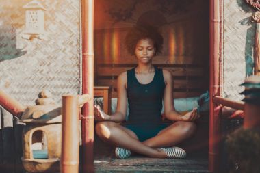 Black girl reached nirvana during meditation clipart