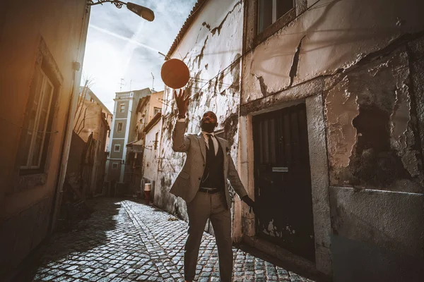 African man spinning a basketball — Stock Photo, Image