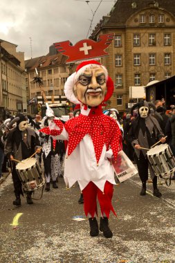 BASEL, SWitzerland, 11 Mart 2019. İsviçre, Basel 'deki geleneksel karnaval maskeleri geçit töreni..