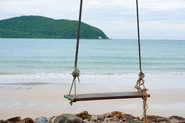Swings on the sand tropical beach. — Stock Photo, Image