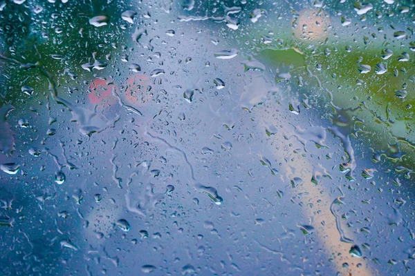 Gocce di pioggia su vetro. Contesto — Foto Stock