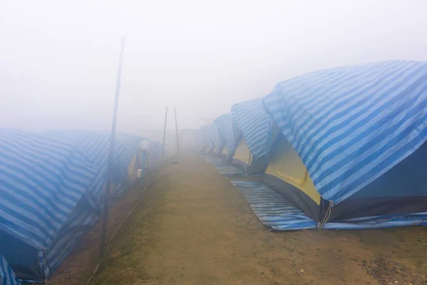 Travel tent in the morning with fog