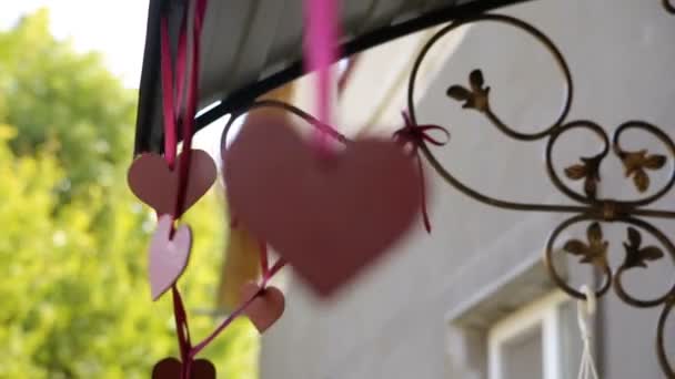 Heart shapes with bokeh effect as background — Stock Video