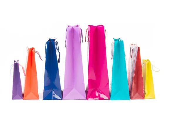 Paquetes de compras multicolores y brillantes para regalos y regalos — Foto de Stock