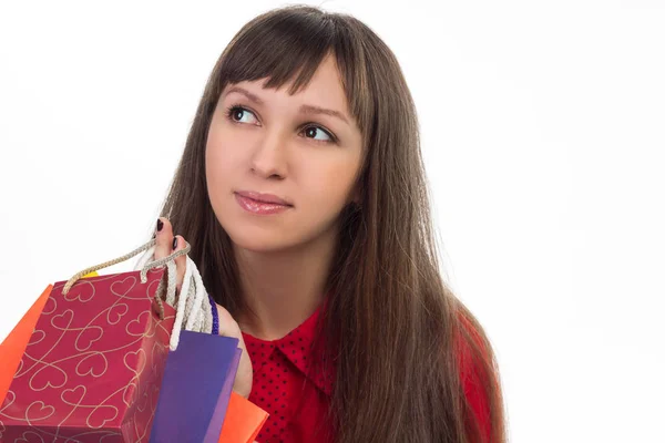 Nahaufnahme einer jungen Frau mit bunten Einkaufstüten — Stockfoto