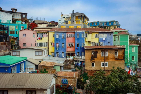 Valparaiso, Chile - March 08, 2020: Multi Colored Buildings with Bright Painting on the Street