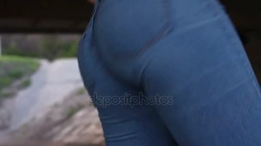 Sexy Woman Ass Dancing in jeans. Shaking Butt Closeup