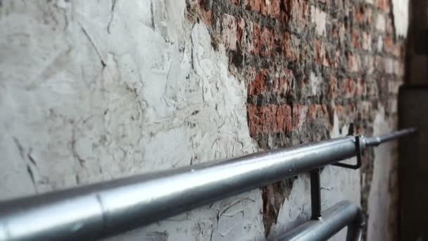 The heating pipes on the bricks wall — Stockvideo