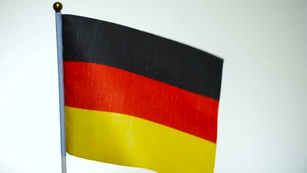 German flag on flagpole flying and waving in the wind. — Stock Video