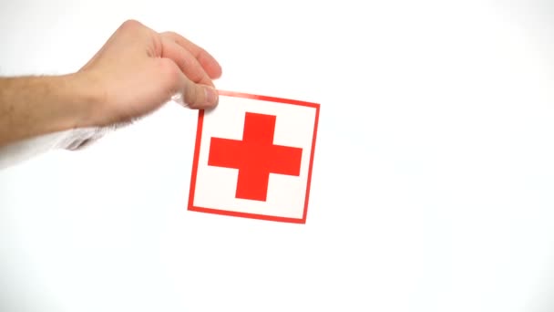 Ufa, Rusland - 22 januari 2020 Hand met medisch teken geïsoleerd op wit — Stockvideo
