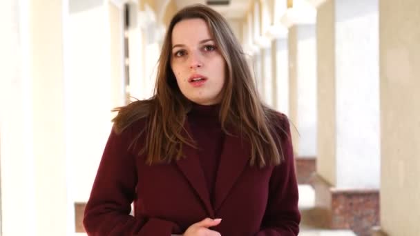 Portrait nervous stressed young woman student feels awkward looking away sideway. Girl is worried — Stock Video