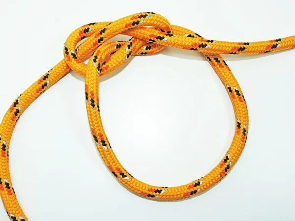Жовта мотузка з деякими вузлами . — стокове фото