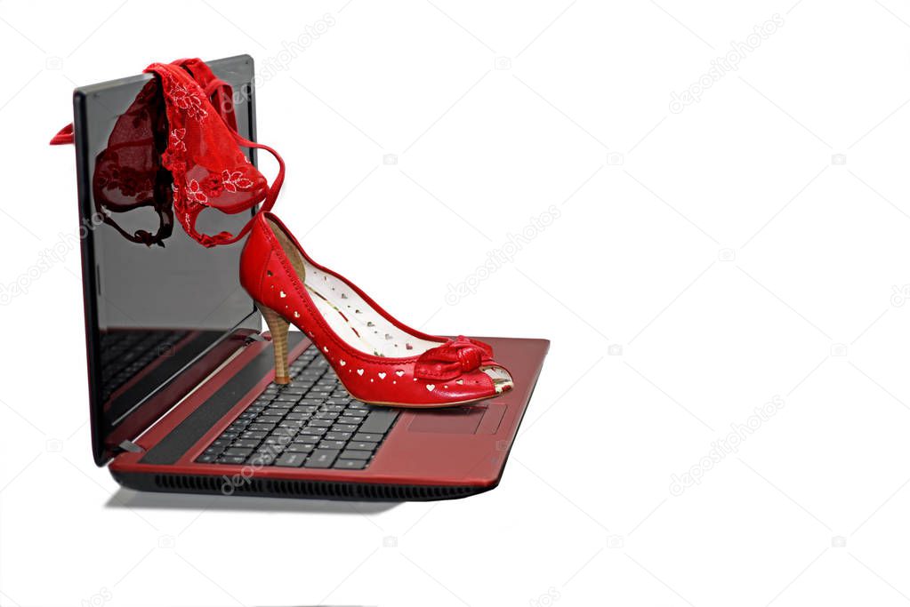 Woman red panties on laptop.