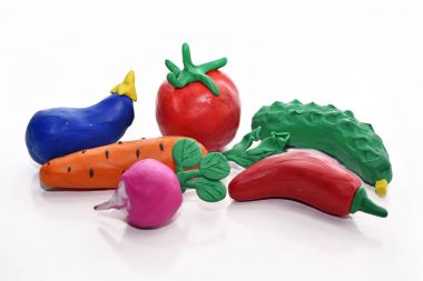 Vegetables made from plasticine. clipart