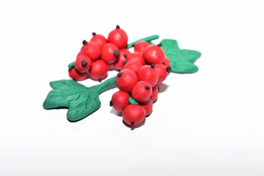 Red currant made from plasticine. clipart