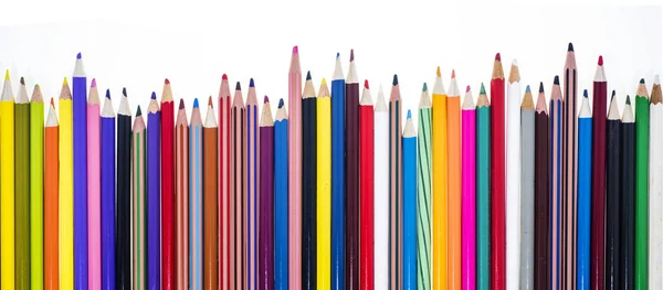 A tábla a színes ceruzák. — Stock Fotó
