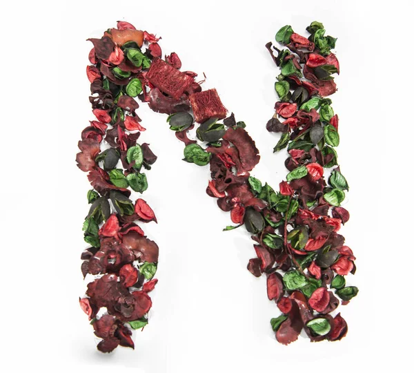 Latin alphabet letter made from dry rose flowers. — 스톡 사진